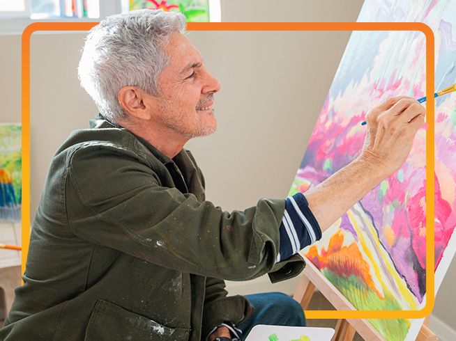 Senior living resident painting