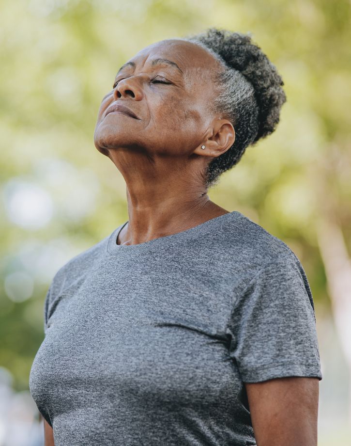 Woman meditating outside
