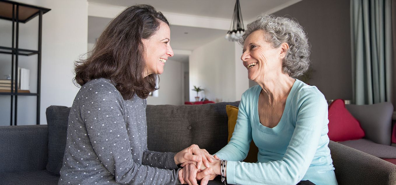Senior woman talking to daughter