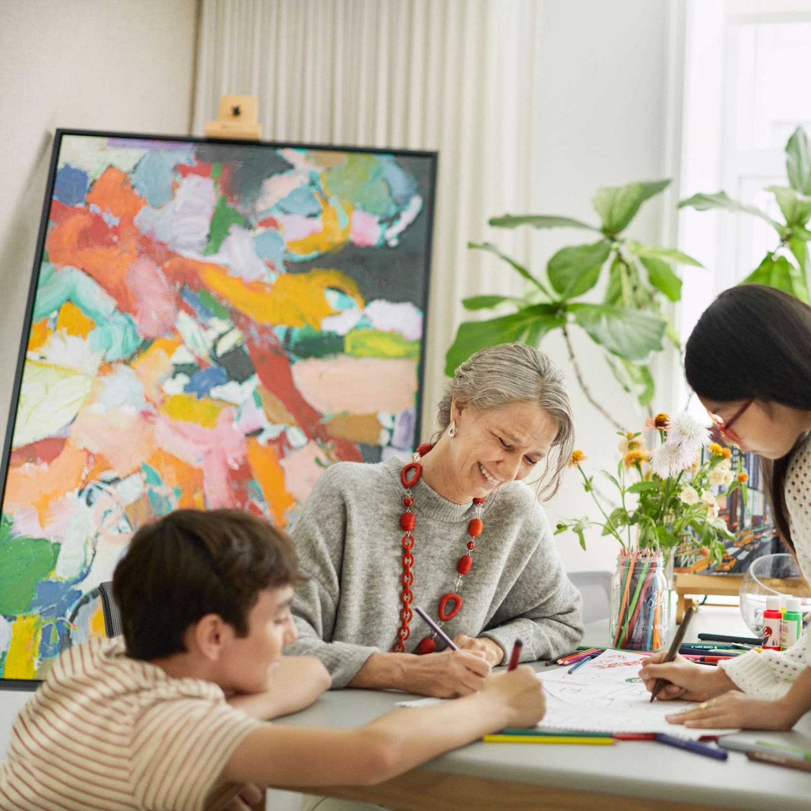 Resident Painting with their Family at The Apsley