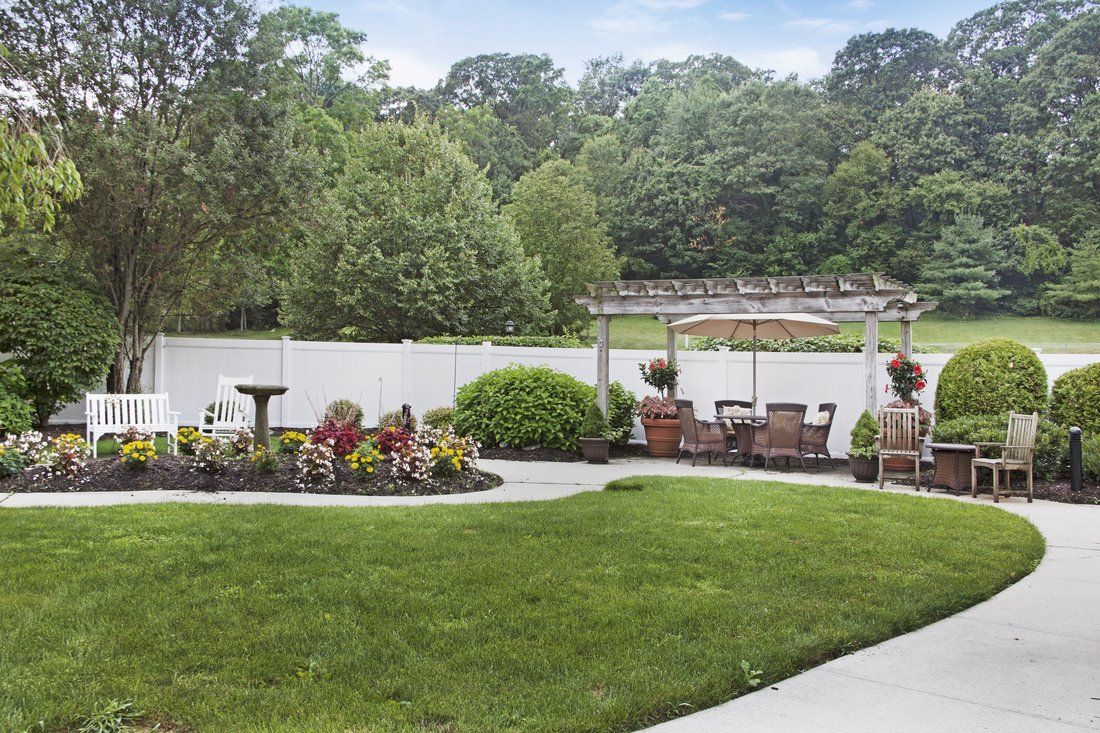 Secure Reminiscence Memory Care Courtyard at Sunrise of Dix Hills