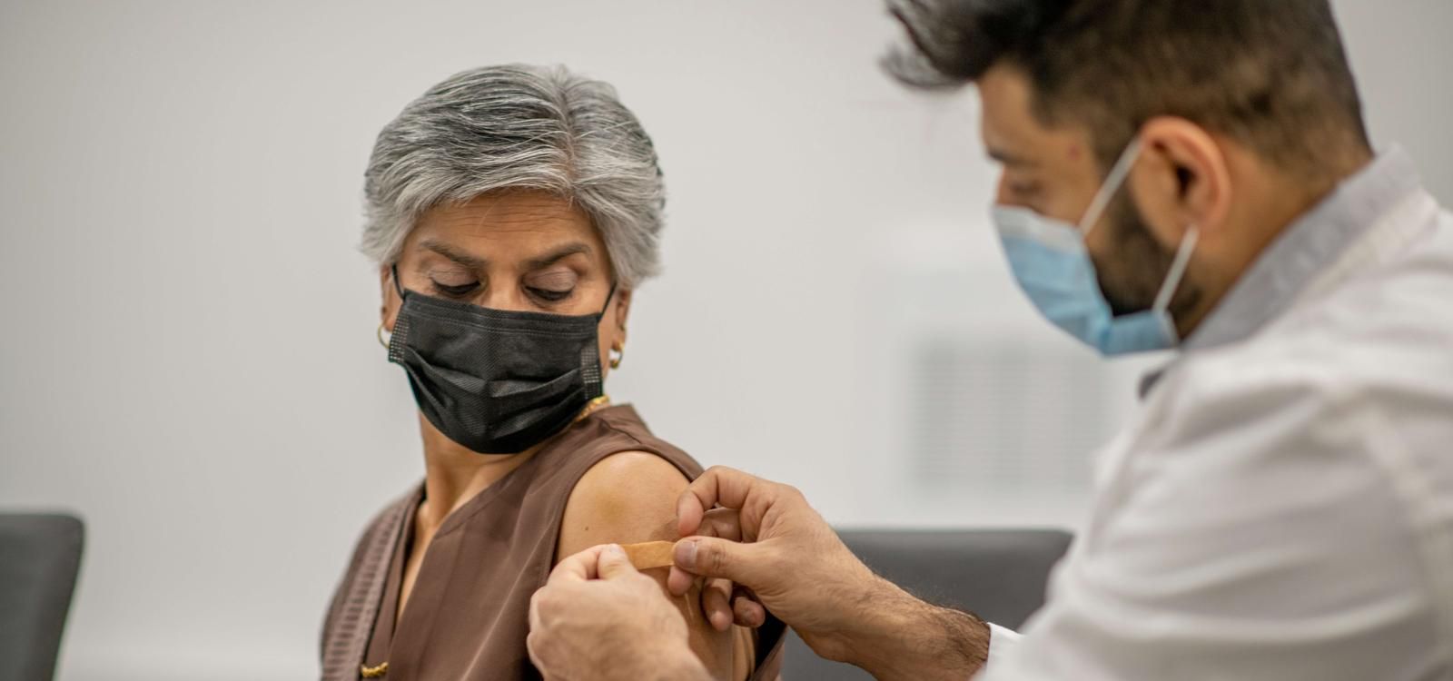 resident receiving vaccination