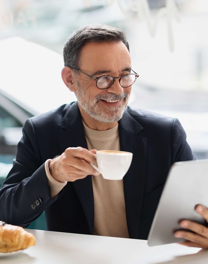 Male resident having coffee
