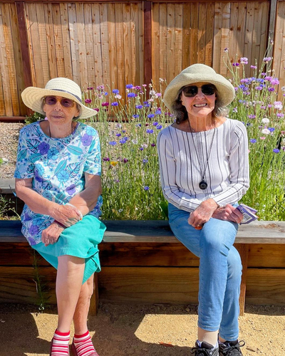 Senior women gardening