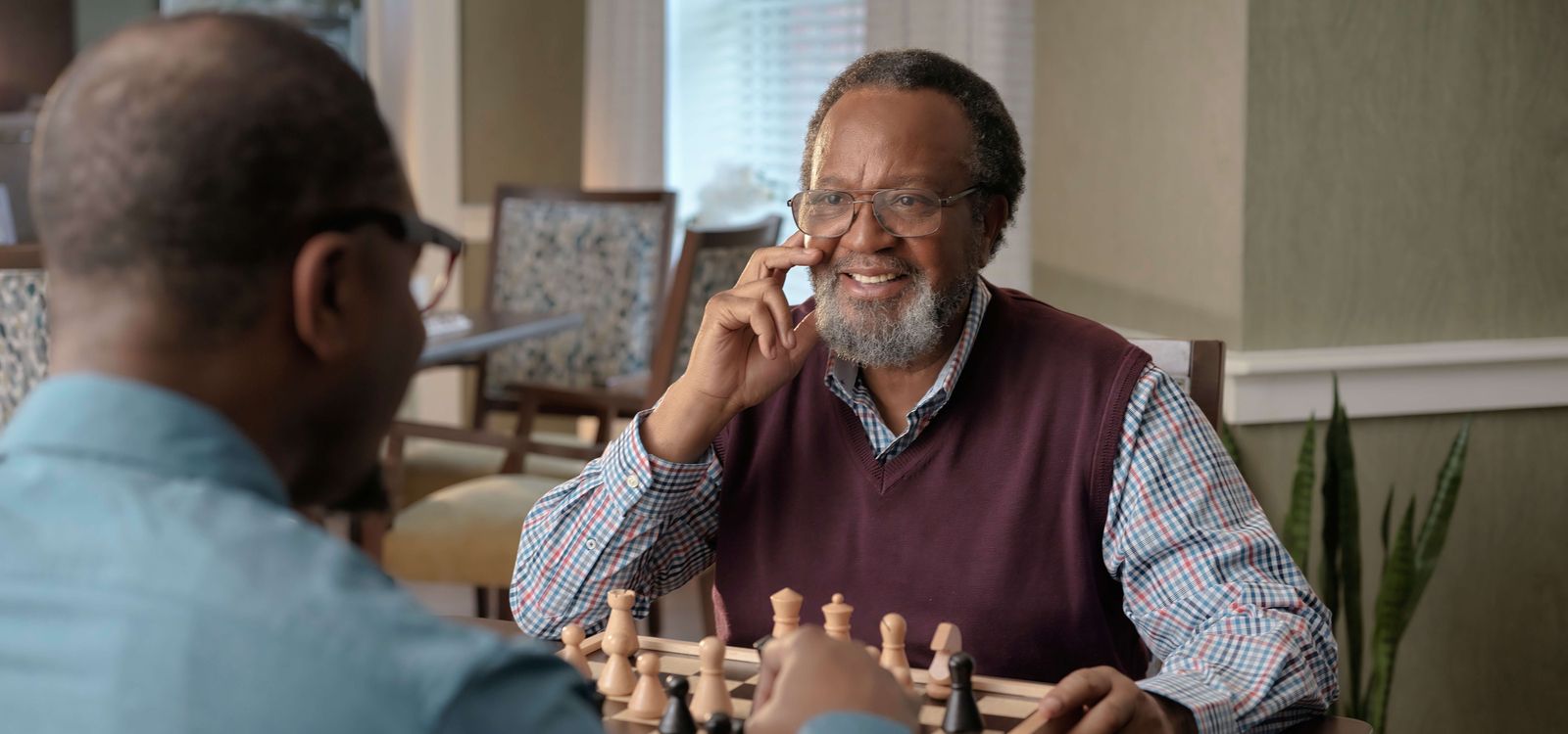 Resident and Son Playing Chess