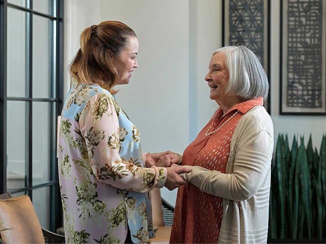 Mother and Daughter Holding Hands