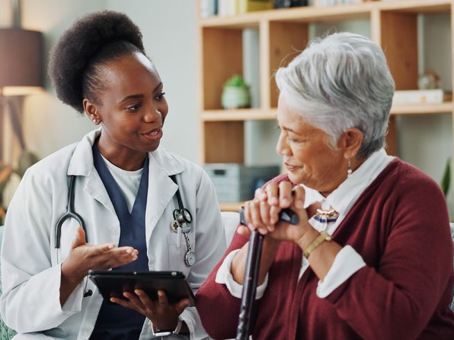 Senior and doctor talking