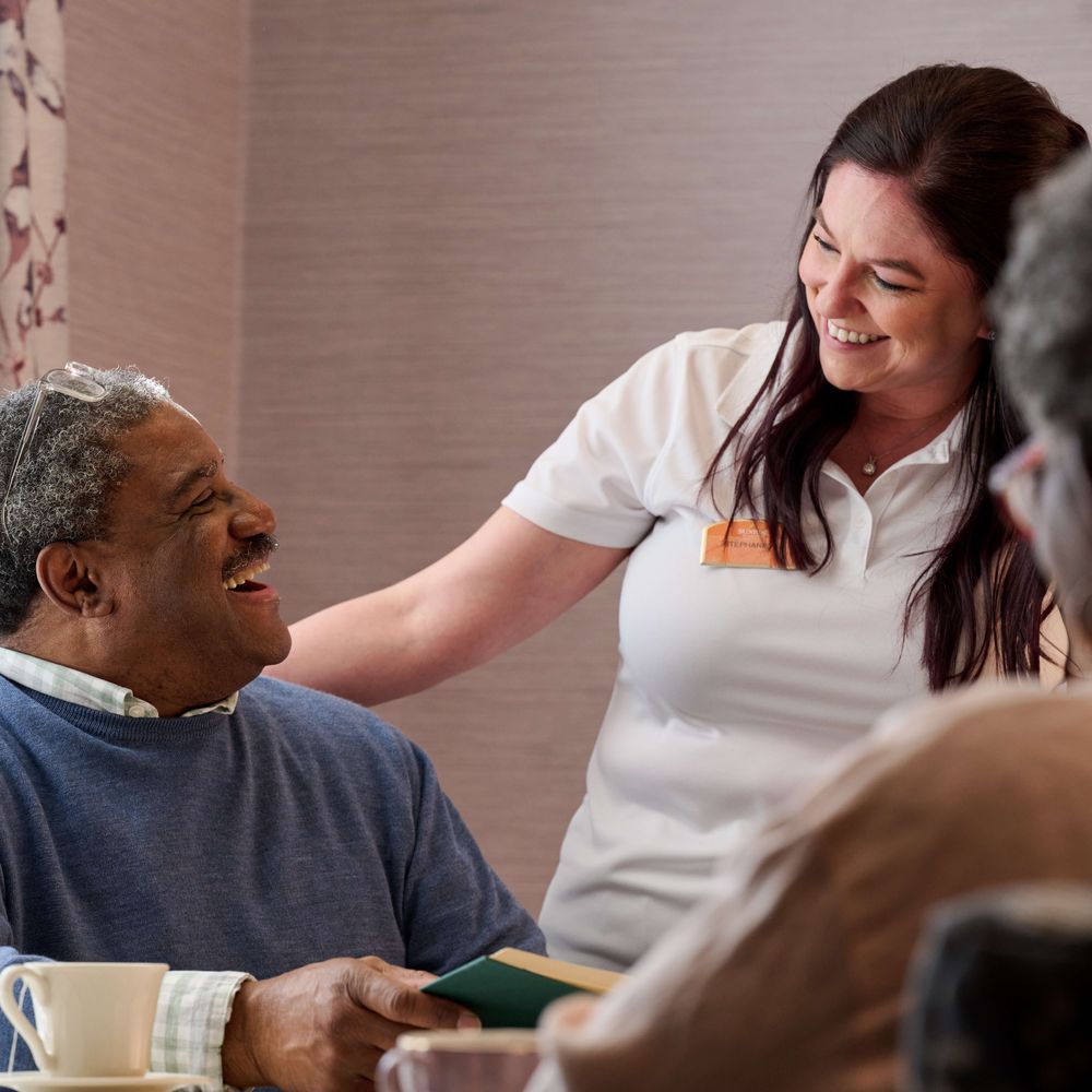 Resident Chatting with Team Member