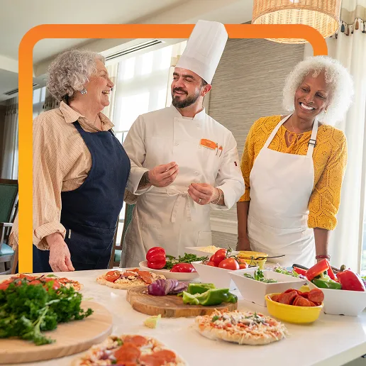 senior living residents in a pizza class