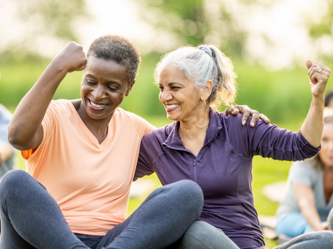 Senior women exercising and flexing their muscles