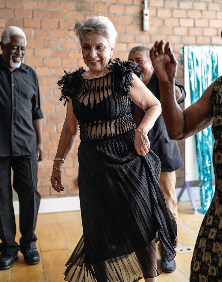 Friends dancing at event
