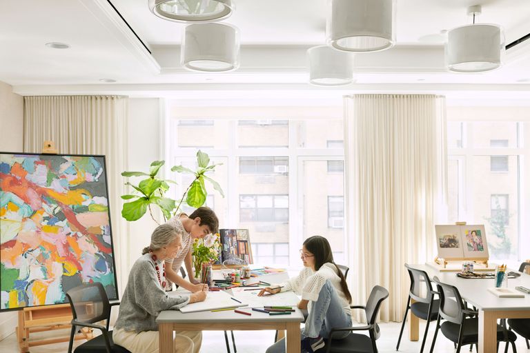 Resident Painting with their Family at The Apsley