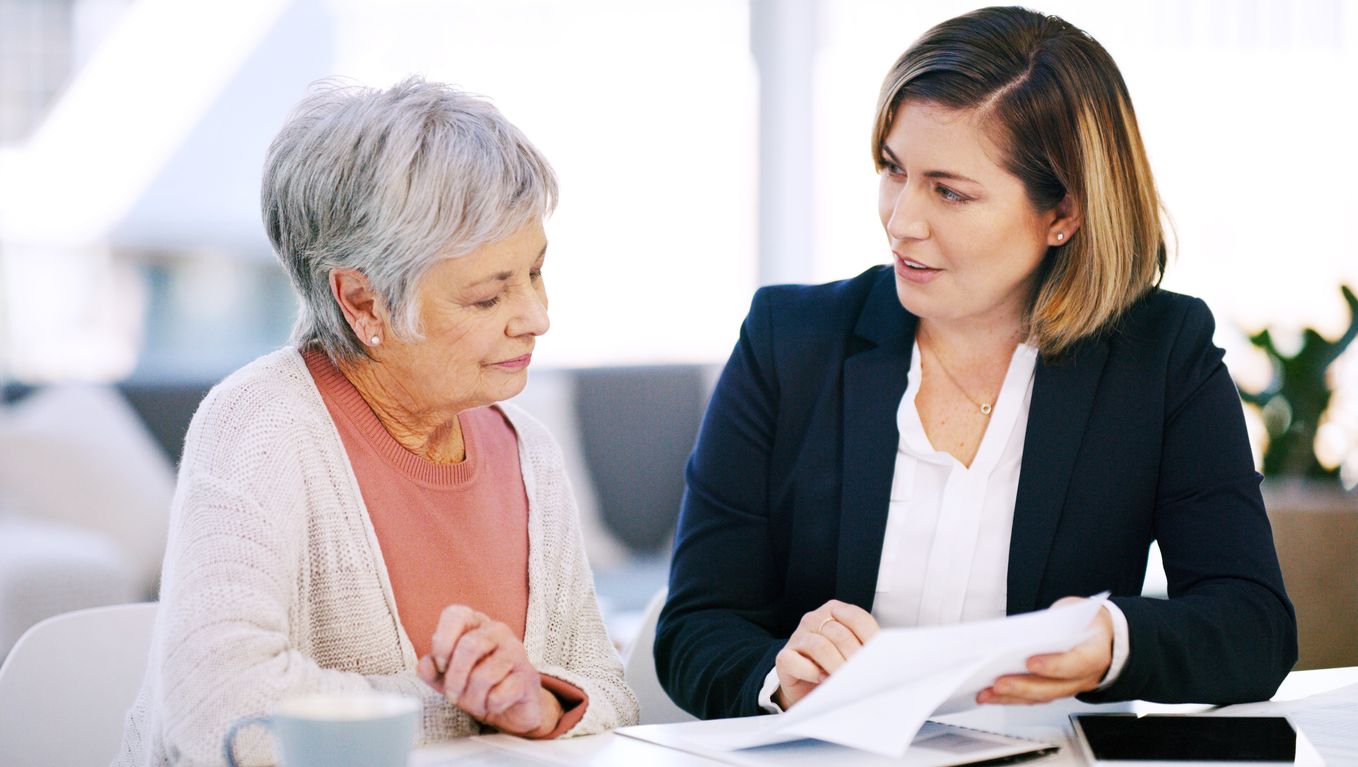 Senior and advisor discussing taxes