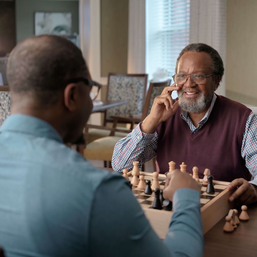 Resident and Son Playing Chess