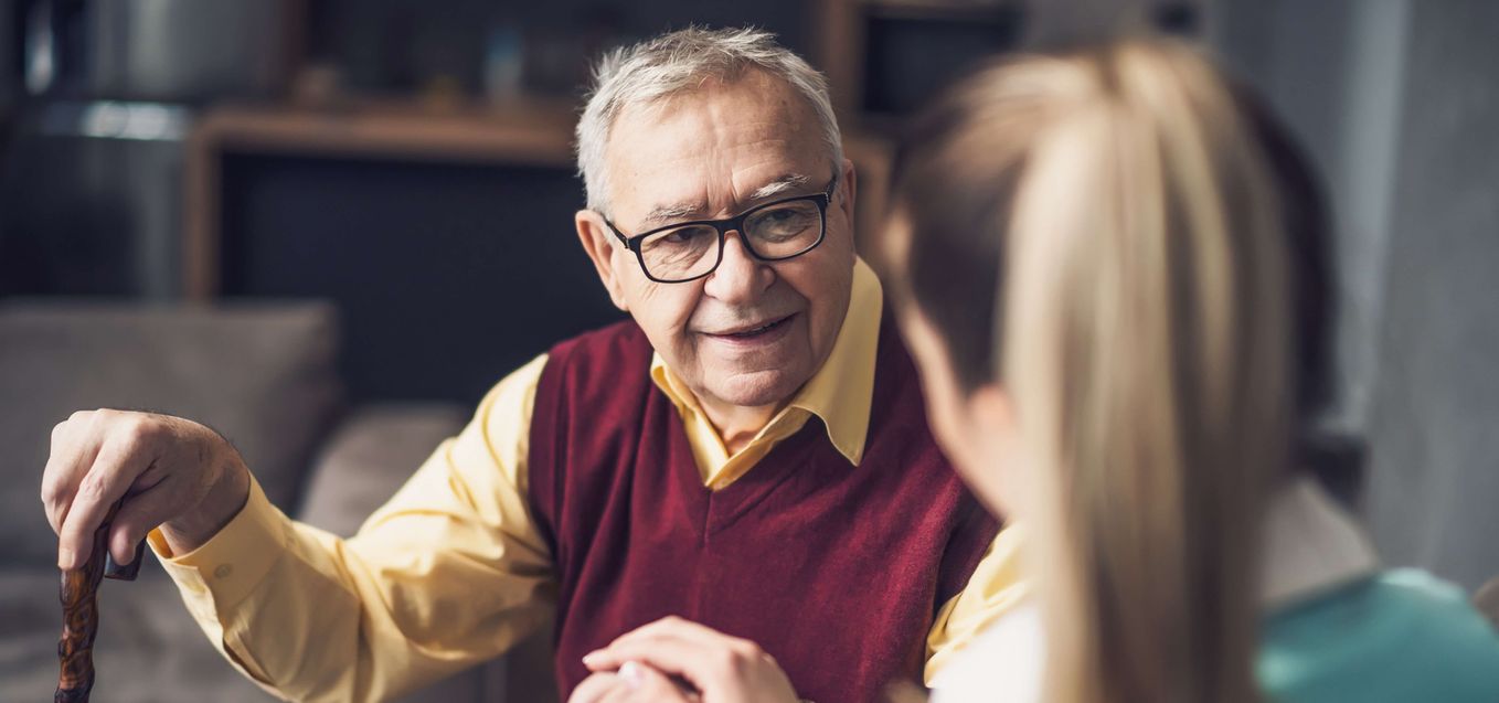 Senior man talking to a family member