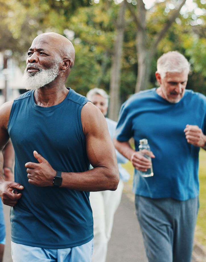 Senior friends walking club outside