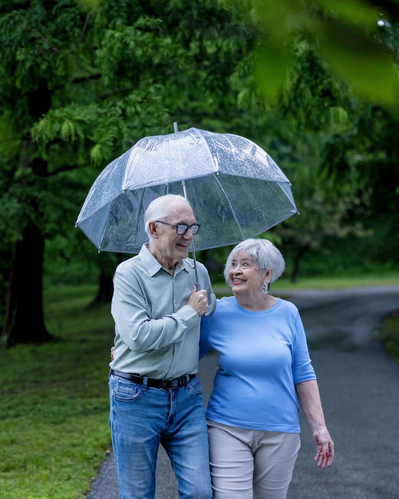 Couple walking in the rain