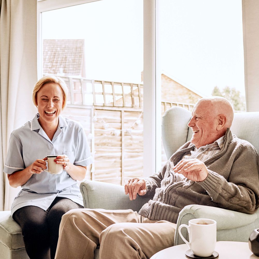 Medical professional and older male talking