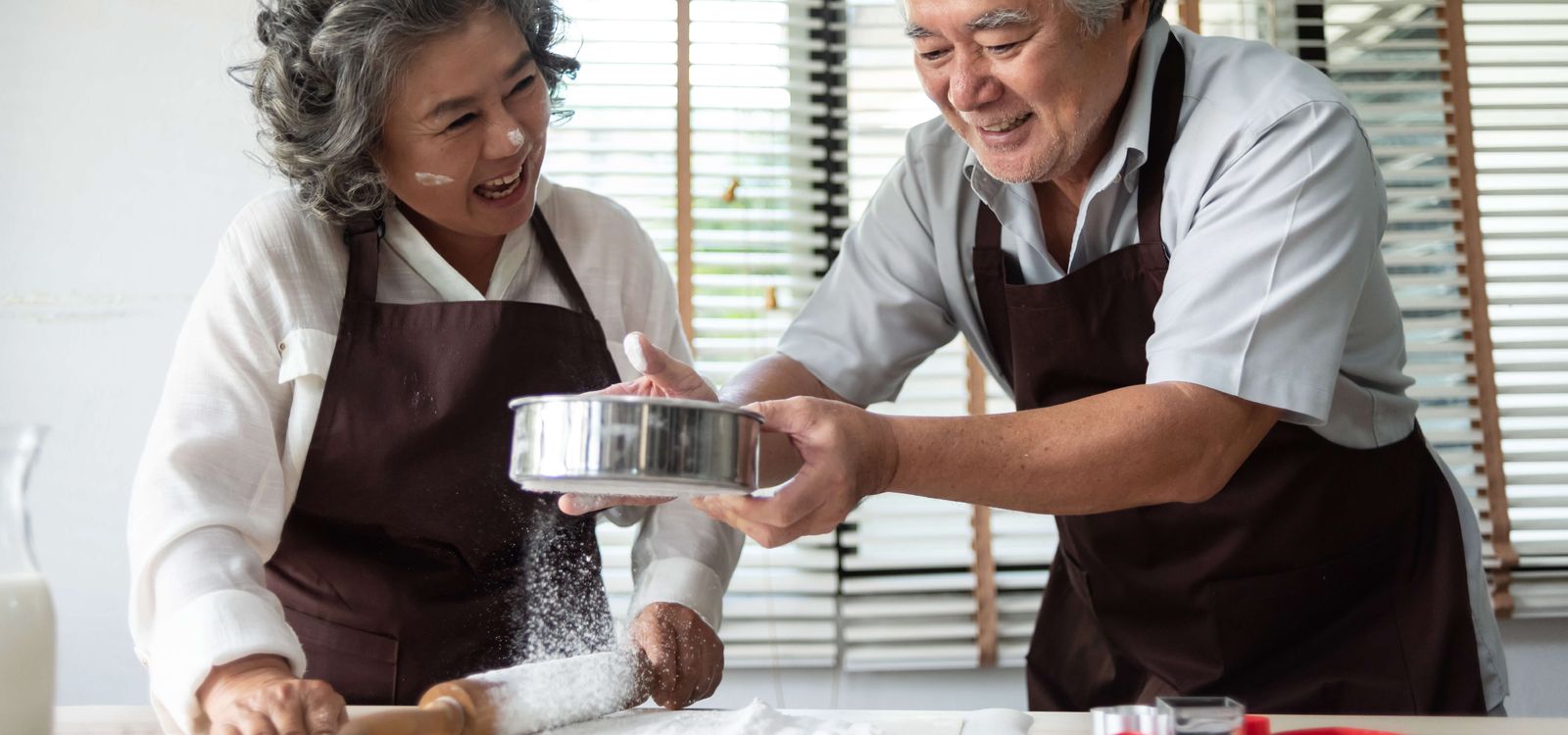 Couple baking cookies