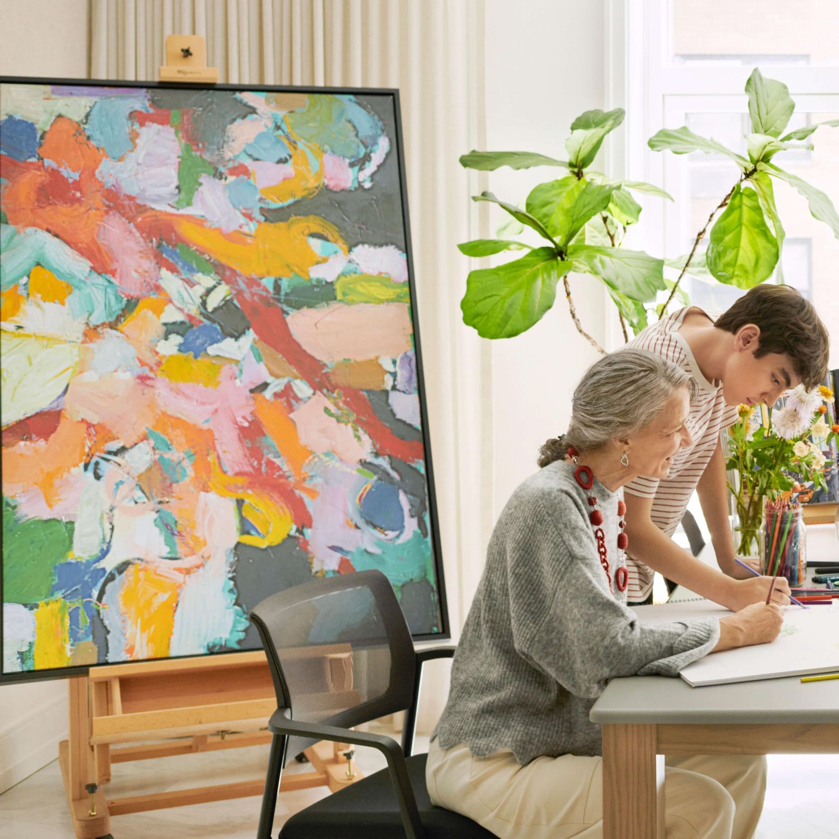 Resident Painting with their Family at The Apsley