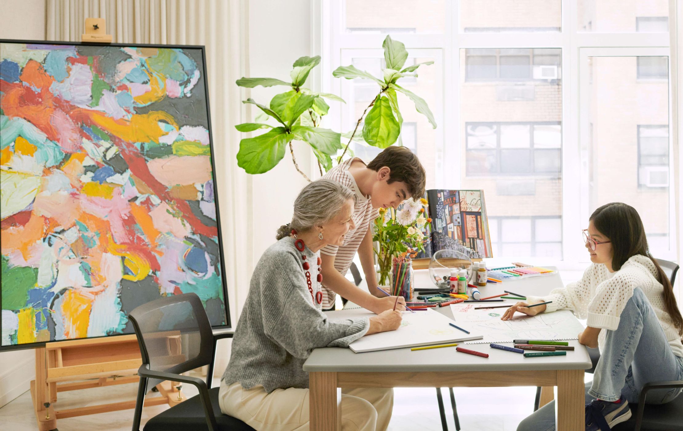 Resident Painting with their Family at The Apsley