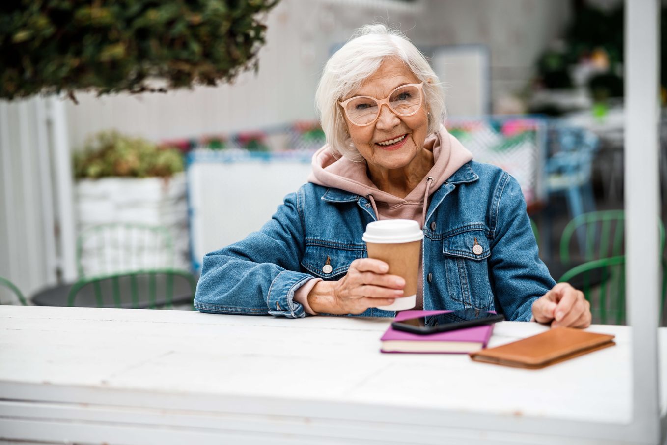 Older Woman at an Outdoor Coffee Shop
