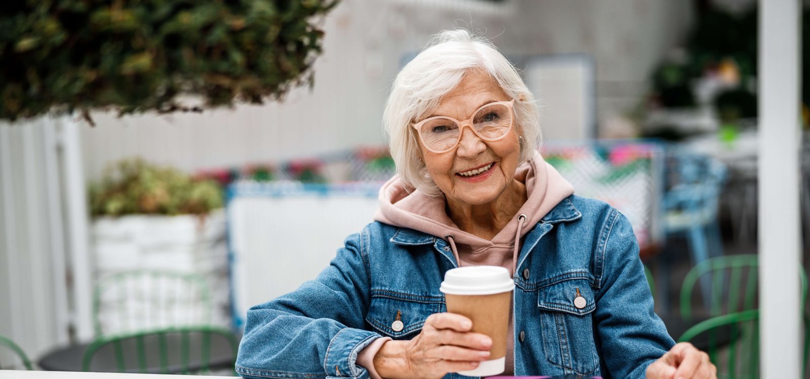 Older Woman at an Outdoor Coffee Shop