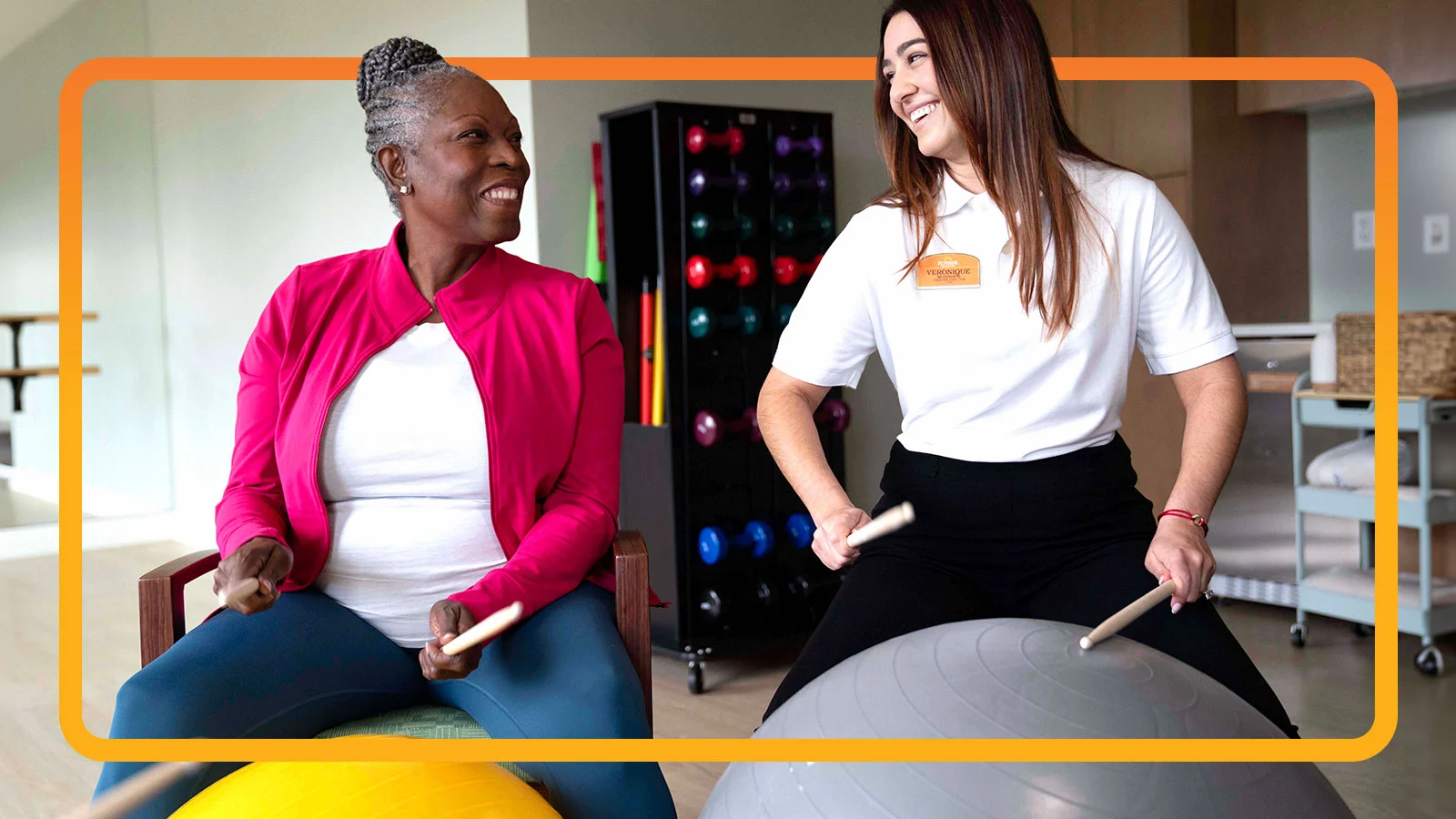 senior living resident and activity coordinator in a music class