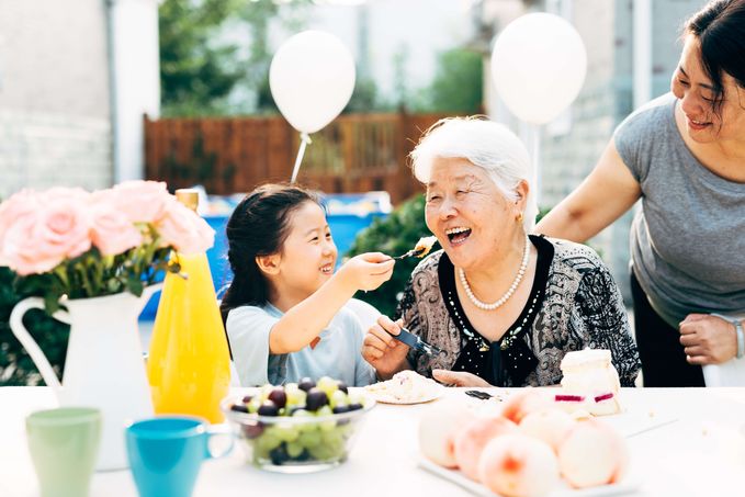 resident enjoying a meal with family