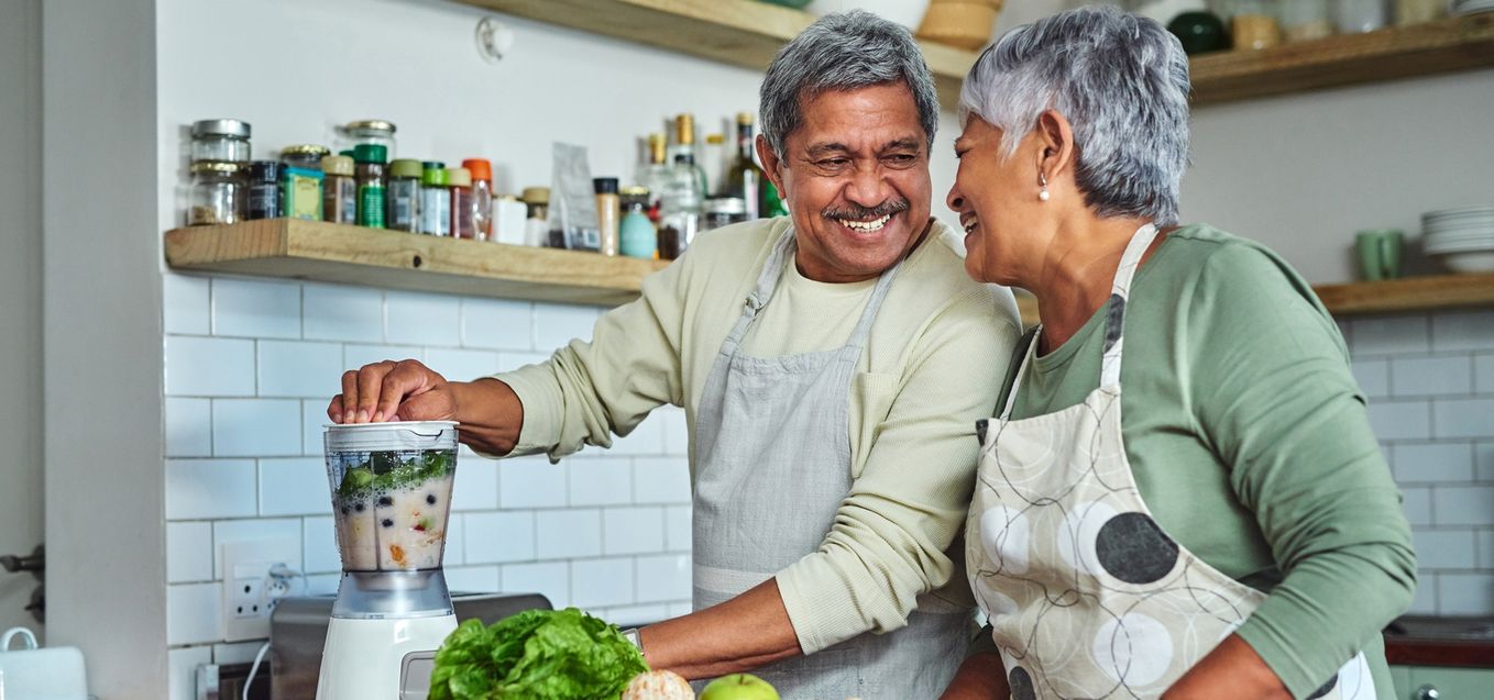 Senior couple cooking together