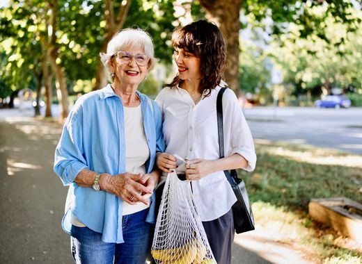 Senior and Caregiver Running Errands