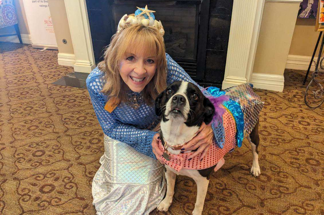 Sunrise Team Member with Community Dog