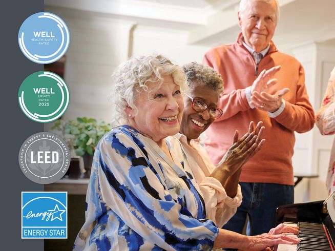 Sunrise Senior Living earns WELL, LEED, and ENERGY STAR certifications, shown with certification badges over a photo of seniors.