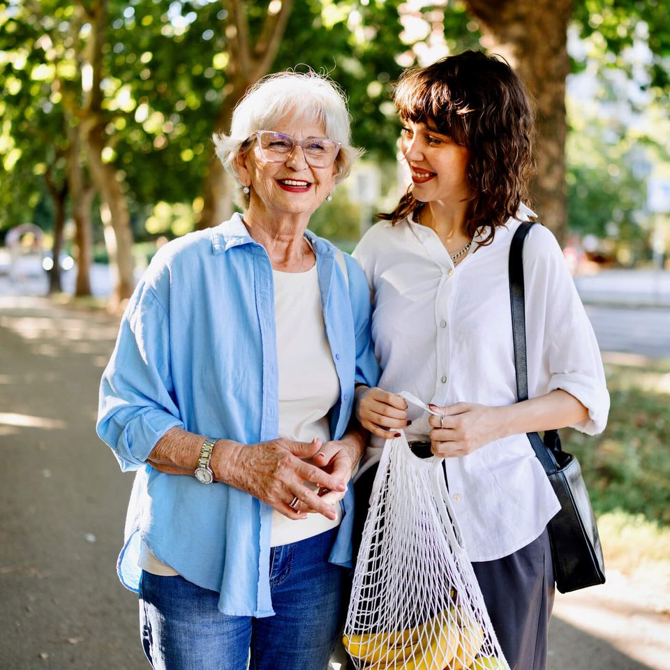 Senior and Caregiver Running Errands