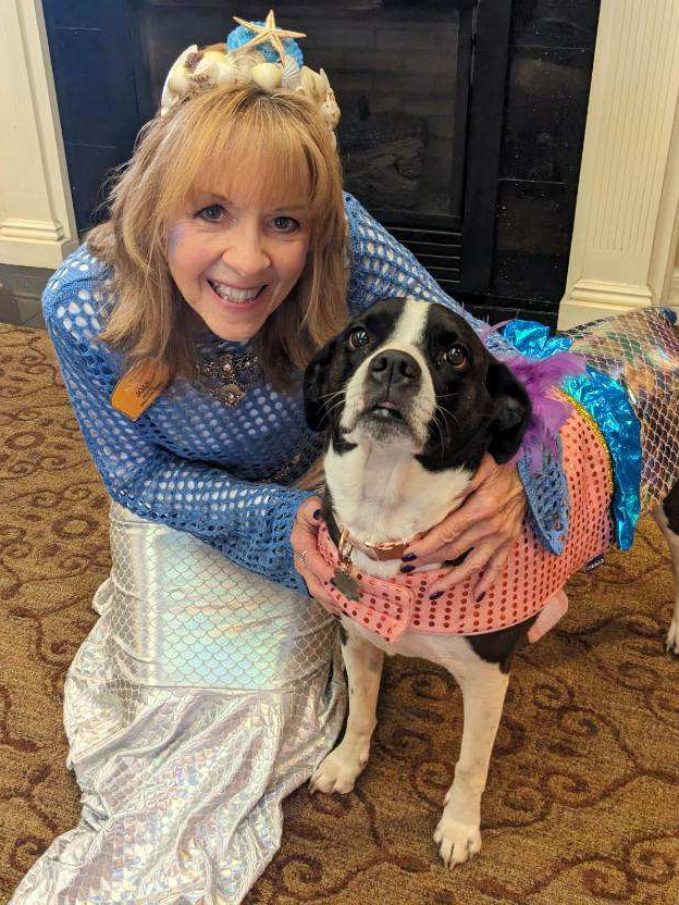 Sunrise Team Member with Community Dog
