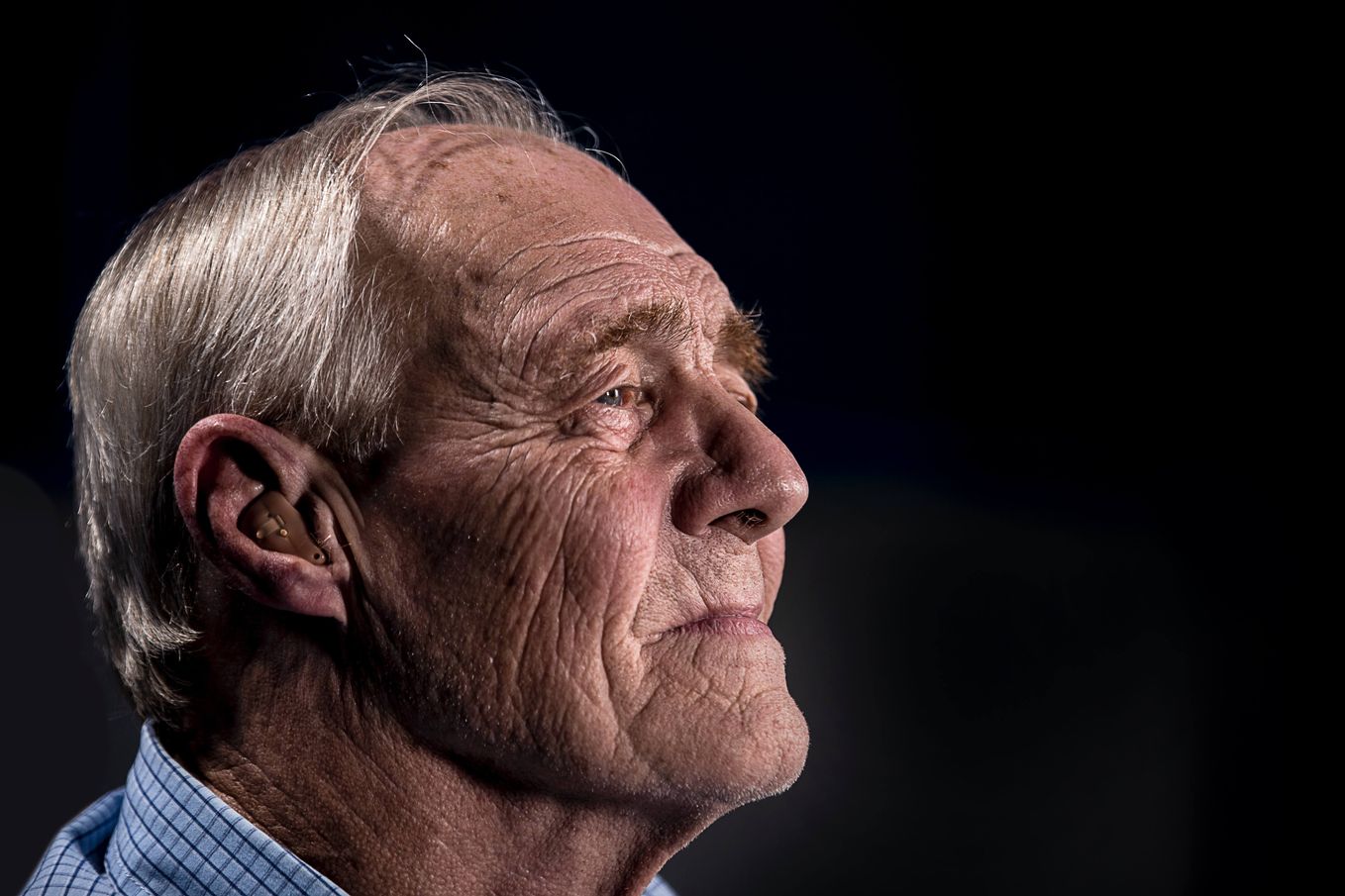 male with hearing aid
